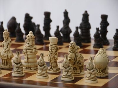 Alice in Wonderland Ornamental Chess Set (cream & brown, board not included)