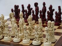 Classic Movie / Film Stars Ornamental Chess Set by Berkeley Chess (in cream & red, chessboard not included)